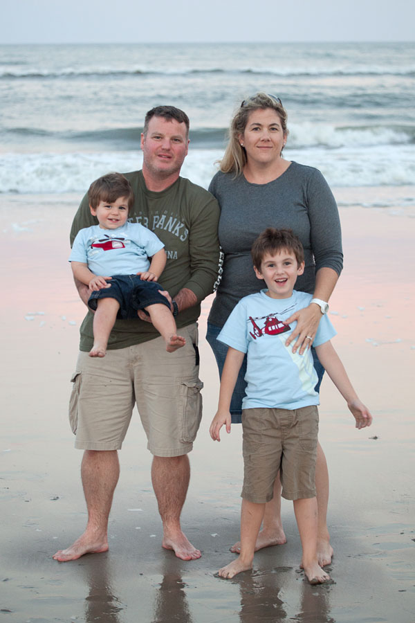 Family at the beach in Corolla, NC | Photo by Charlotte Geary