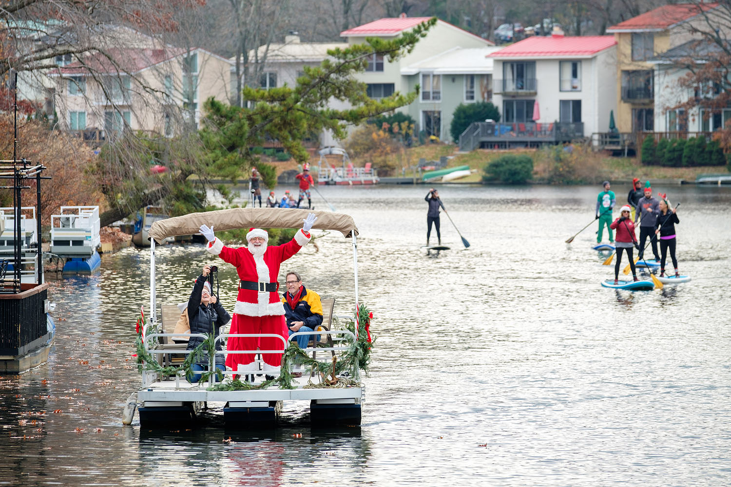 Santa arrives at Lake Anne Plaza at Jingle on Lake Anne