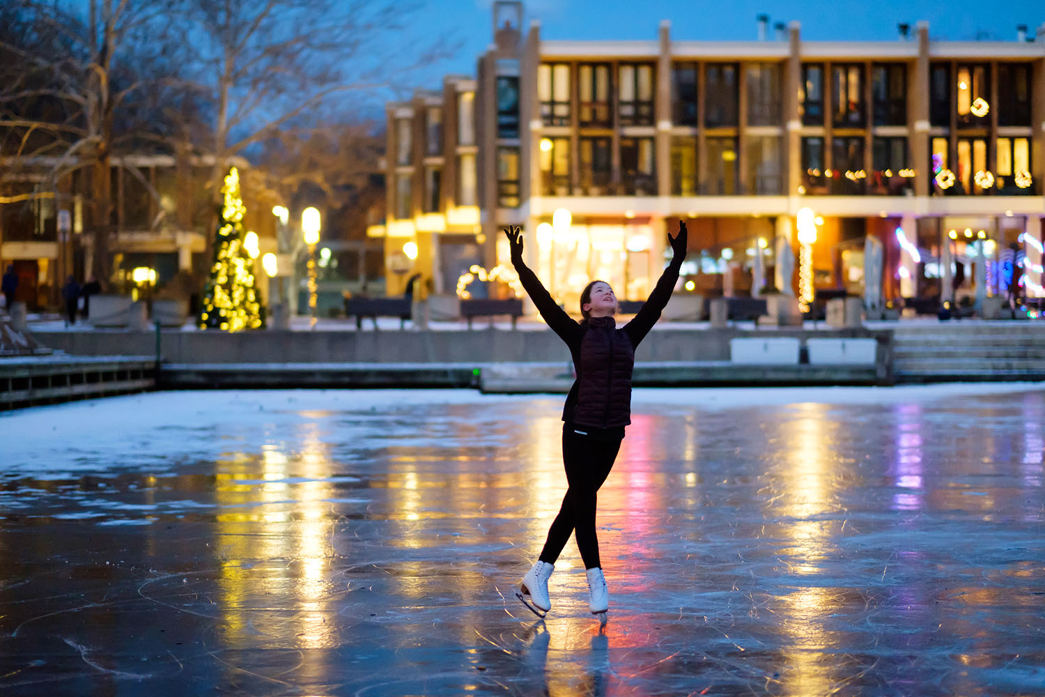 Ice skater on frozen Lake Anne in Reston, Virginia