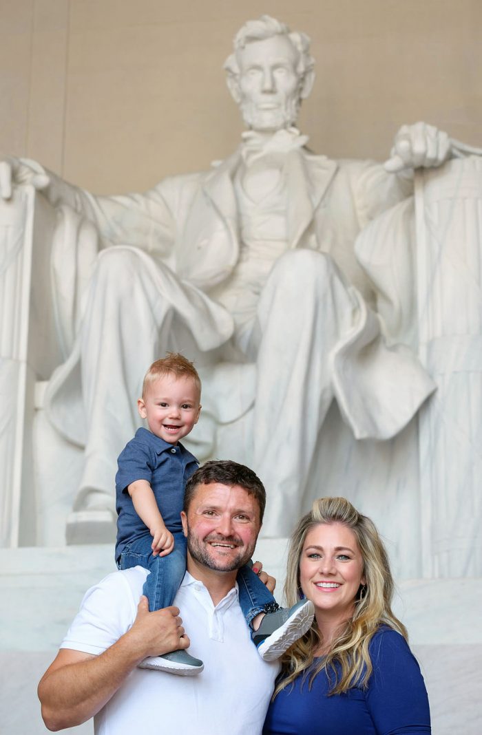 Family portrait inside Lincoln Memorial