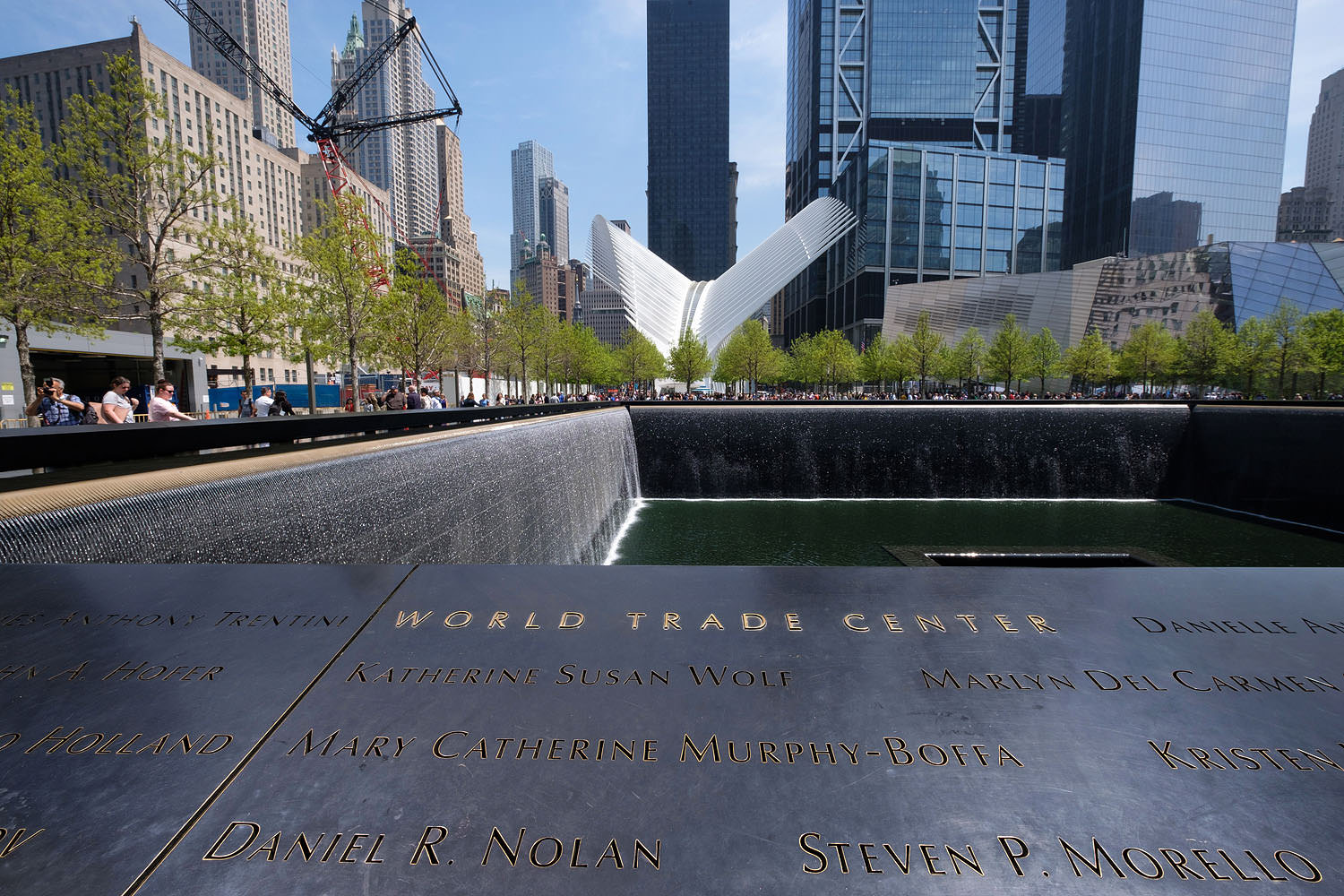 9/11 Memorial with the Oculus in the background