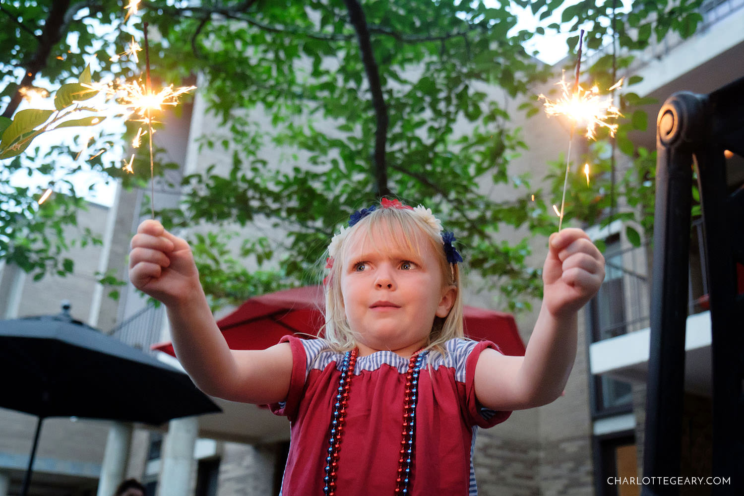 Child with sparkler on the 4th of July
