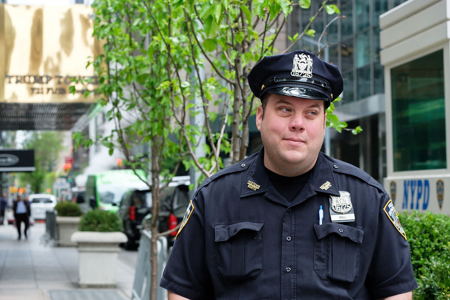 Police officer guarding Trump Tower (New York, New York)